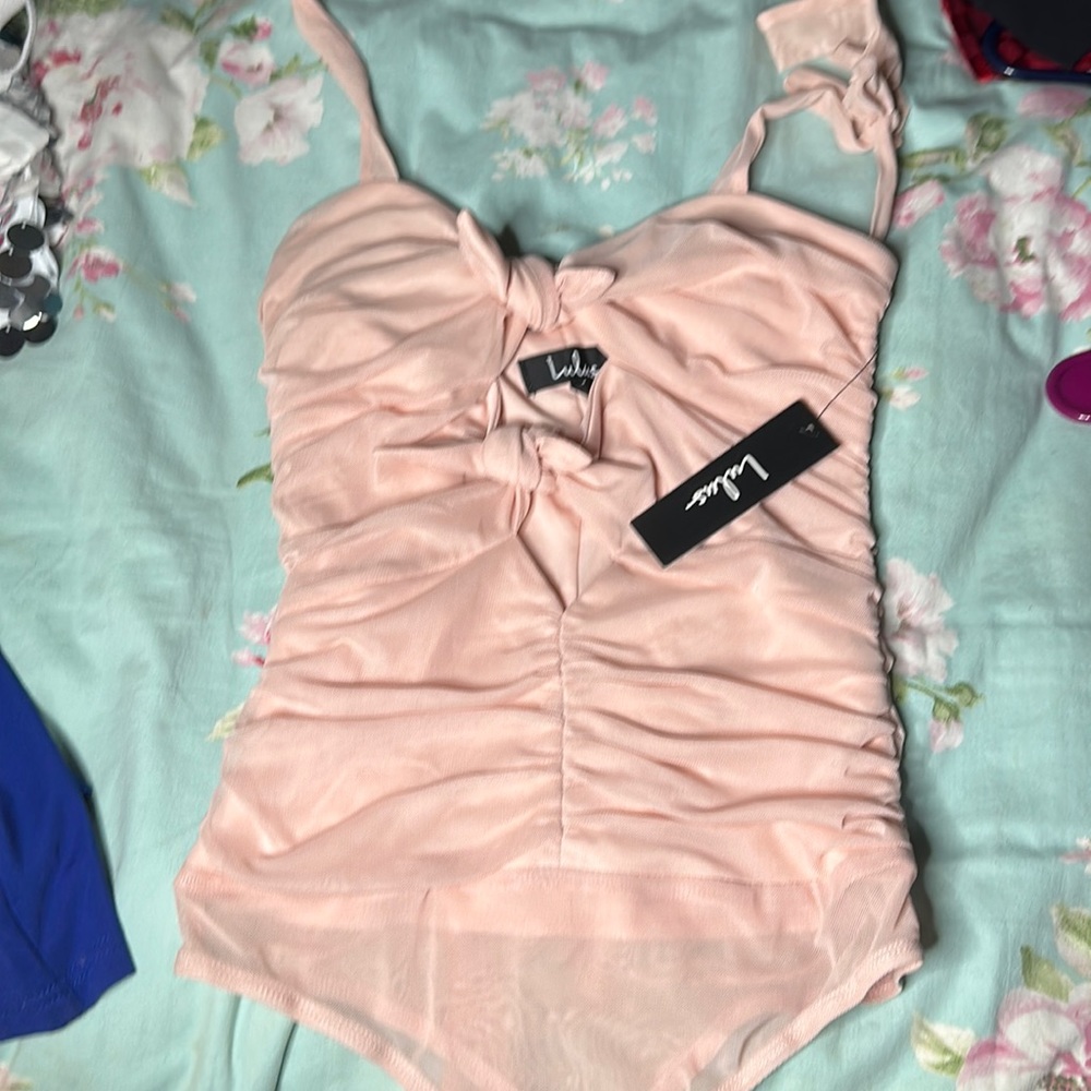NWT Pink cut out bodysuit